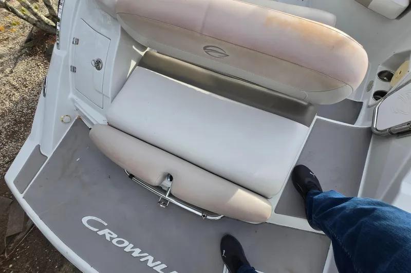 Slide: The Image of 2012 Crownline Eclipse E4 boat interior with seating and flooring details. - 15