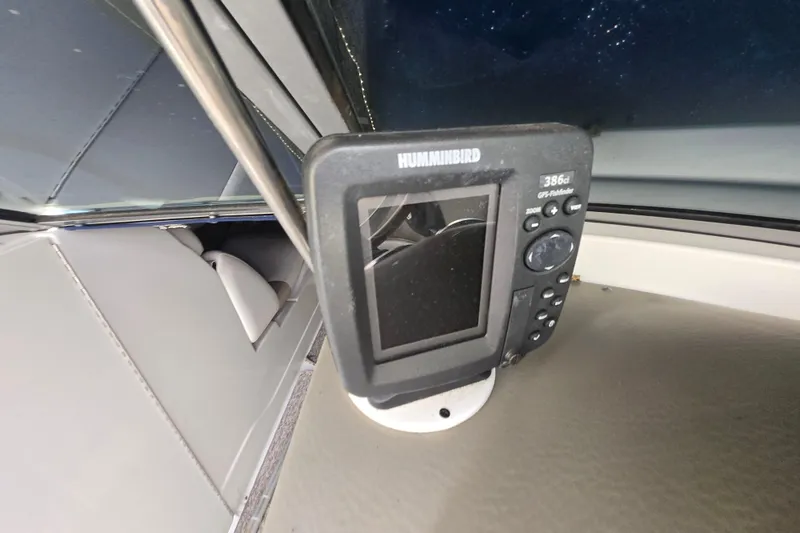 Slide: The Image of Humminbird GPS fishfinder on 2012 Crownline Eclipse E4 boat dashboard. - 21