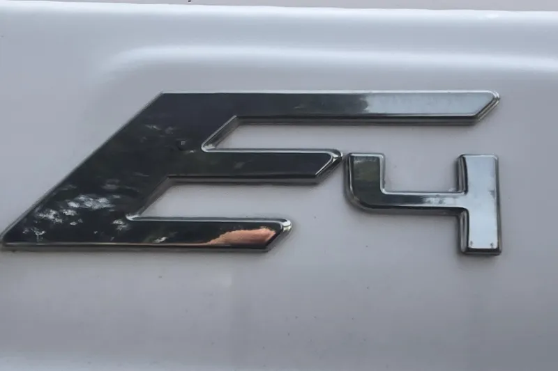 Slide: The Image of Chrome "E4" emblem on 2012 Crownline Eclipse boat. - 23
