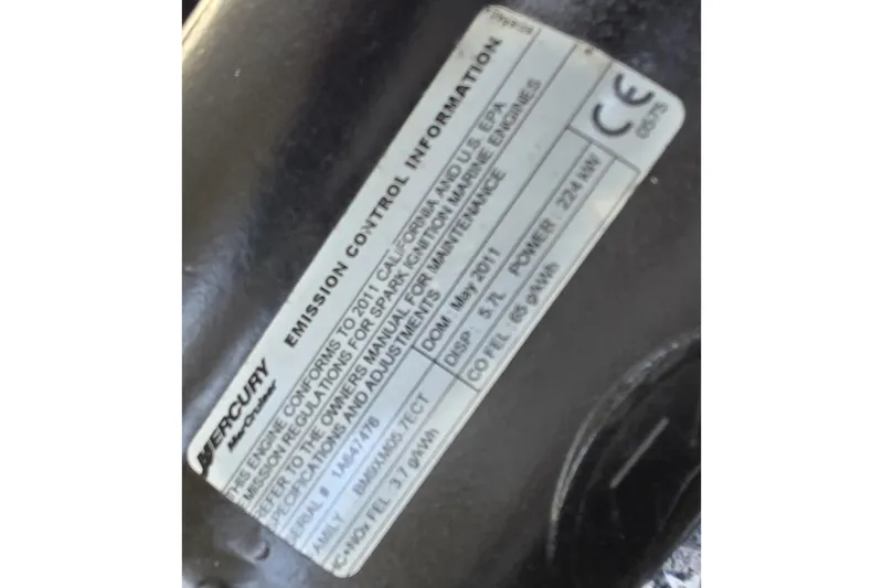 Slide: The Image of Emission control label on 2012 Crownline Eclipse E4 boat engine. - 27