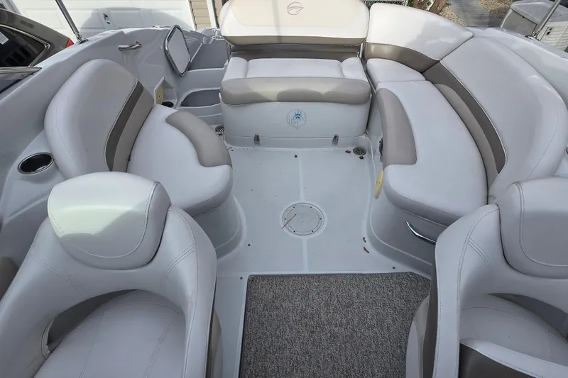 Slide: The Image of Interior of 2012 Crownline Eclipse E4 boat with spacious seating and modern design. - 8