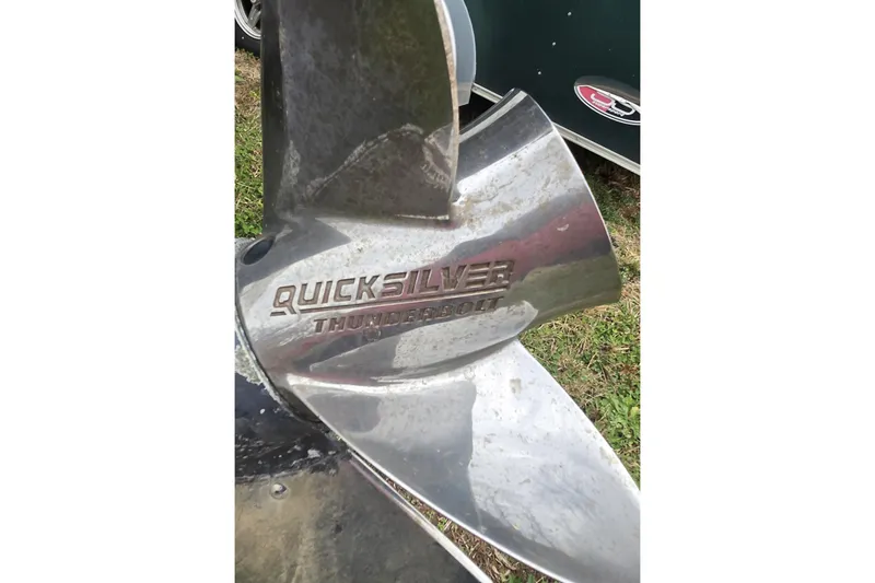 Slide: The Image of 1999 Boston Whaler 21 Outrage boat interior with seating and storage compartments. - 14