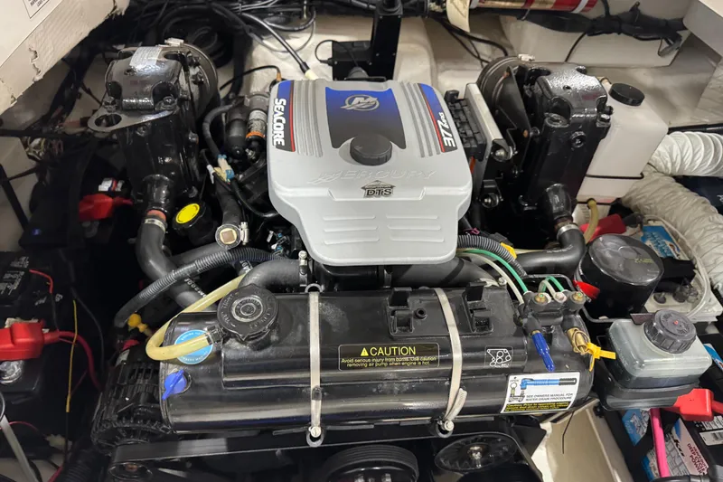 Slide: The Image of Engine of 2010 Rinker 296 Captiva Bowrider boat, detailed view. - 18
