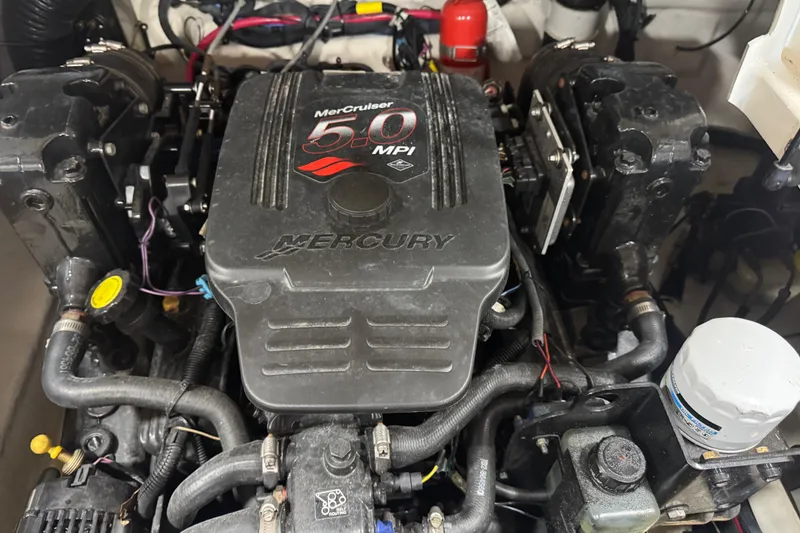Slide: The Image of MerCruiser 5.0 MPi engine in a 2006 Sea Ray 240 Sundeck boat. - 12