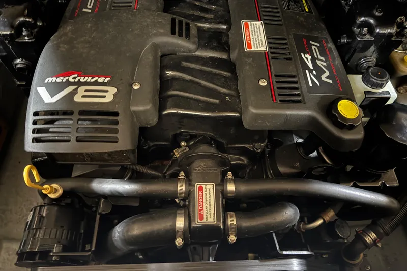 Slide: The Image of MerCruiser V8 engine in a 1998 Sea Ray 280 Bow Rider boat. - 12