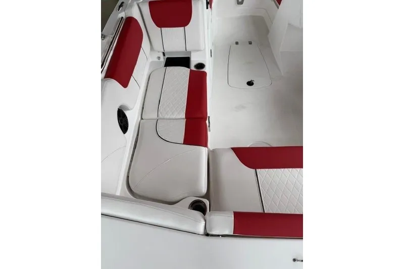 Slide: The Image of Interior of 2026 Tahoe 1950 boat with red and white seating. - 7