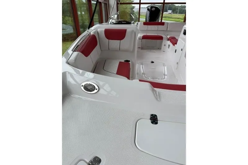 Slide: The Image of Interior of 2026 Tahoe 1950 boat with red and white seating. - 8