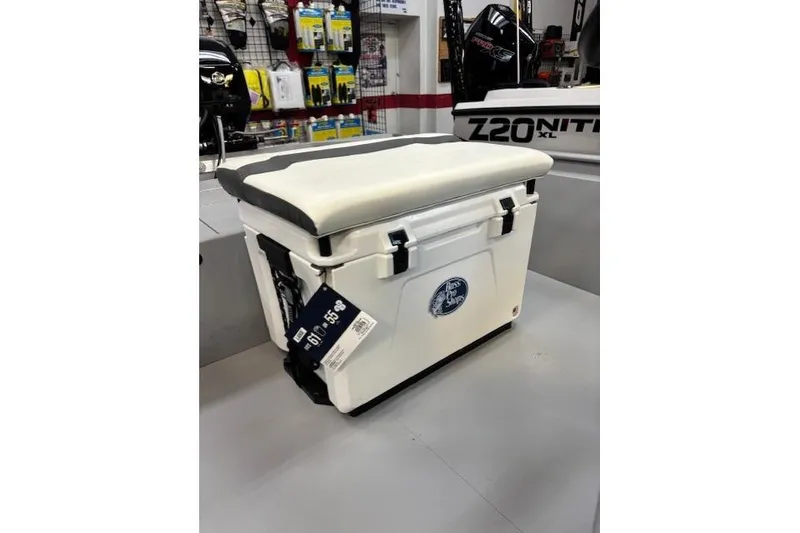 Slide: The Image of White cooler with padded seat in a store, featuring Bass Pro Shops logo. - 5