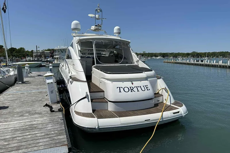 Slide: The Image of 2007 Fairline Targa 47 GT yacht docked at marina, rear view. - 1