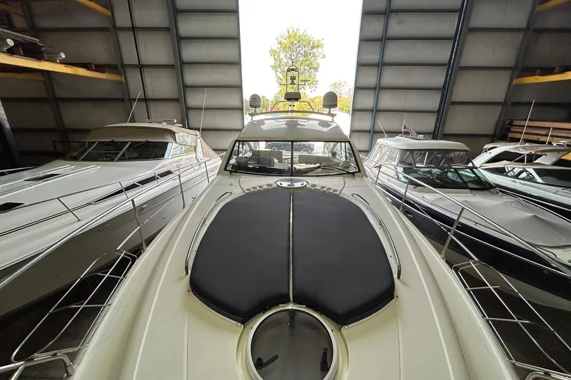 Slide: The Image of 2007 Fairline Targa 47 GT yacht in storage, surrounded by other boats. - 13