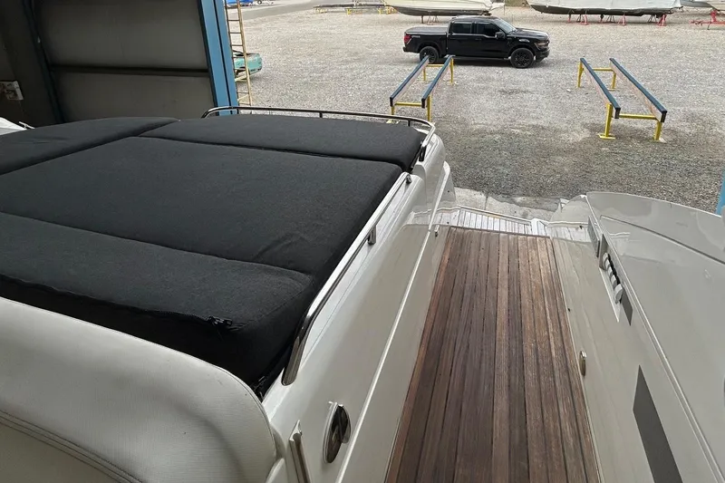 Slide: The Image of 2007 Fairline Targa 47 GT yacht with sunbed and wooden deck in a storage area. - 16