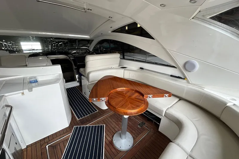 Slide: The Image of Luxurious interior of 2007 Fairline Targa 47 GT yacht with elegant seating and wooden table. - 20