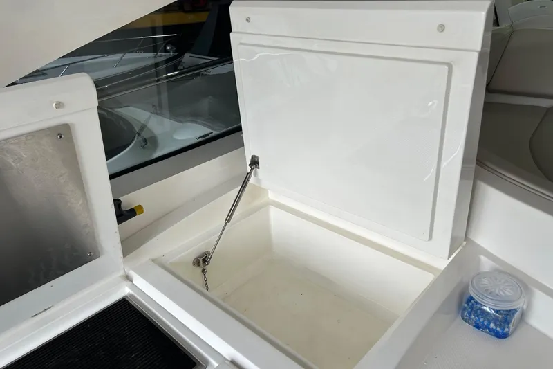 Slide: The Image of Open storage compartment on 2007 Fairline Targa 47 GT yacht, featuring a hydraulic lift. - 23