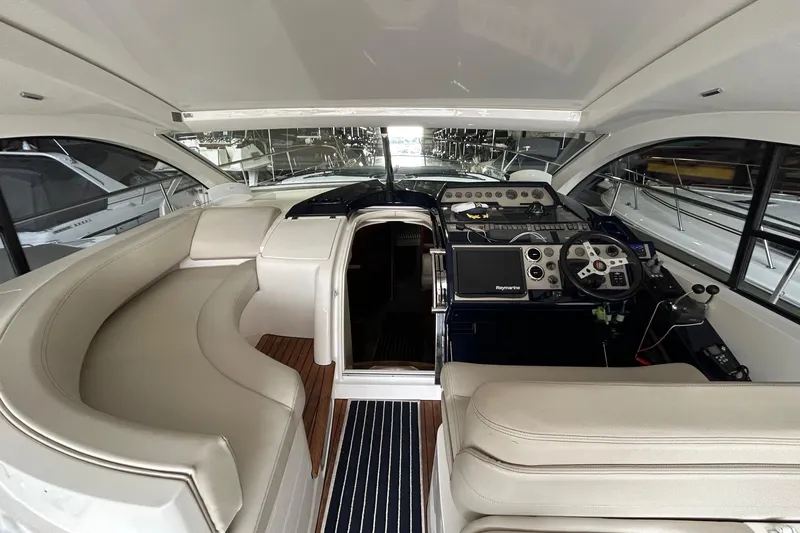 Slide: The Image of Interior of 2007 Fairline Targa 47 GT yacht with modern helm and seating area. - 25
