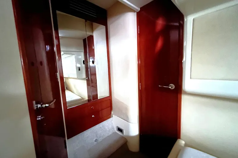 Slide: The Image of Luxurious interior of 2007 Fairline Targa 47 GT yacht with wooden cabinetry. - 39