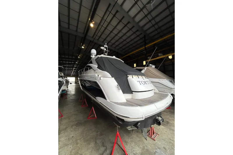 Slide: The Image of 2007 Fairline Targa 47 GT yacht in storage, covered and elevated on stands. - 44