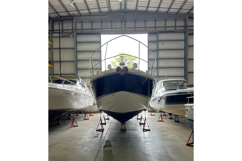 Slide: The Image of 2007 Fairline Targa 47 GT yacht in storage, surrounded by other boats. - 45