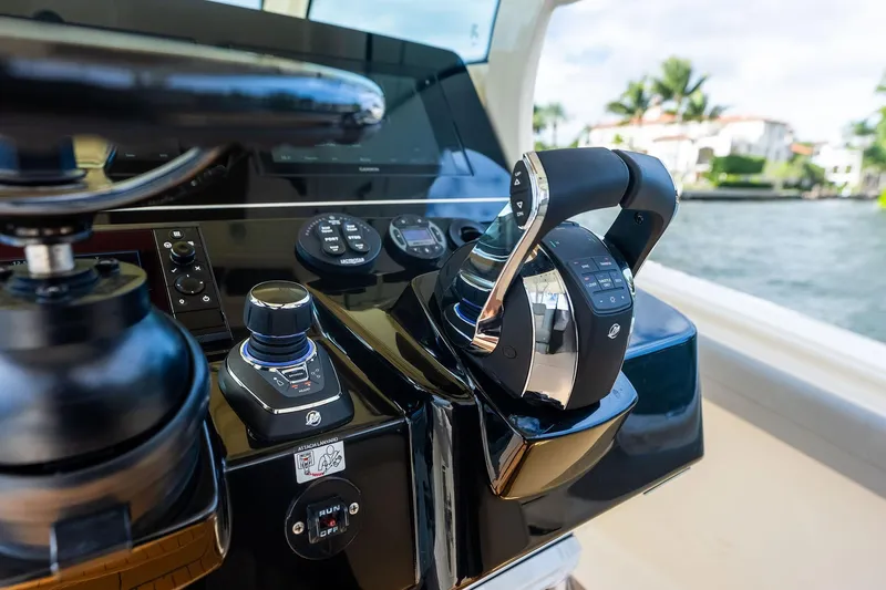 Slide: The Image of Control panel of 2020 Scout 355 LXF boat with modern navigation equipment. - 26