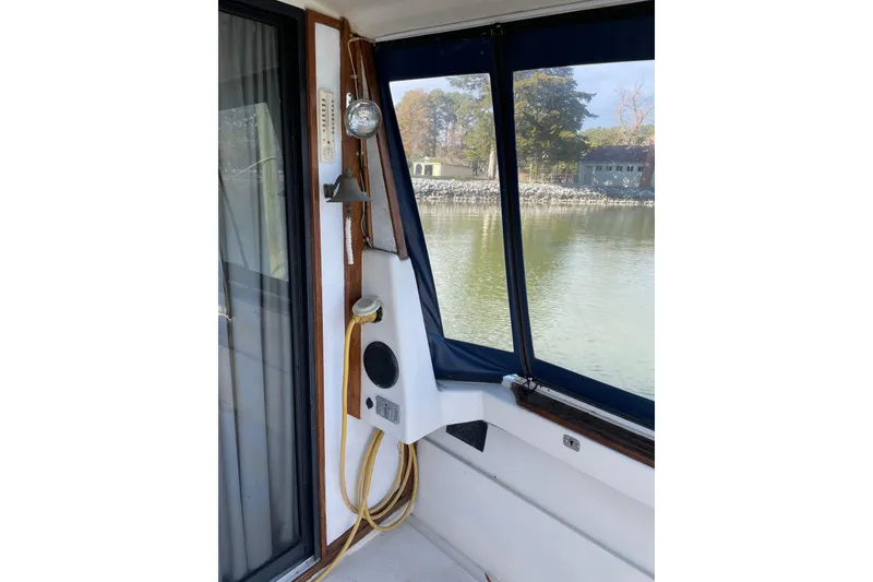 Slide: The Image of Interior view of 1982 Mainship 34 MK 1 boat with window and equipment. - 8