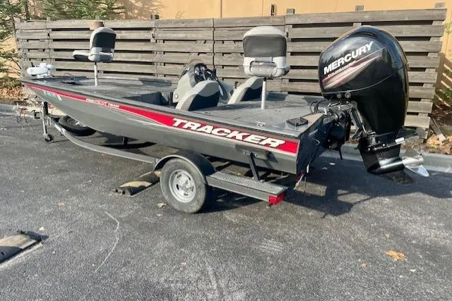 Slide: The Image of 2017 Tracker Pro Team 195 TXW boat with Mercury engine on trailer. - 14