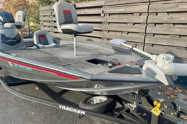 Slide: The Image of 2017 Tracker Pro Team 195 TXW fishing boat on trailer, parked outdoors. - 5