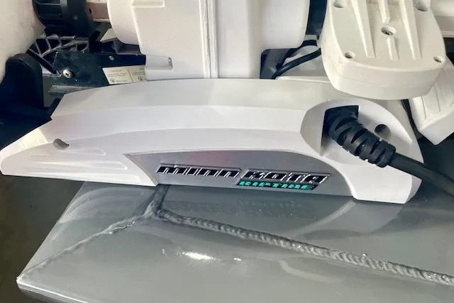 Slide: The Image of 2017 Tracker Pro Team 195 TXW boat motor detail with visible wiring and components. - 6