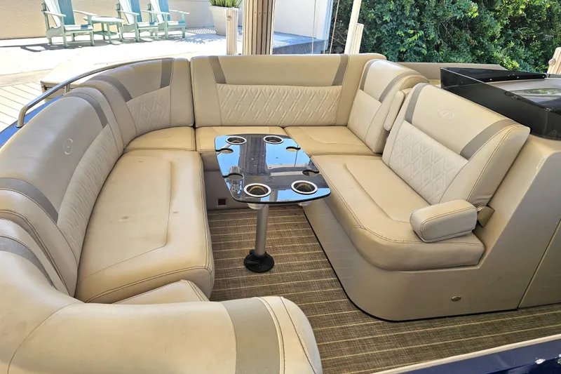 Slide: The Image of 2018 Harris V270 boat interior with modern dashboard and seating. - 20