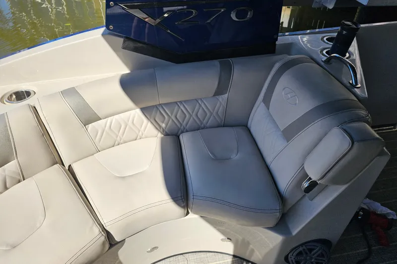 Slide: The Image of Compact bathroom in 2018 Harris V270 boat with sink, toilet, and countertop essentials. - 27