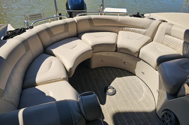 Slide: The Image of 2018 Harris V270 boat interior with beige leather seating and elegant stitching. - 33