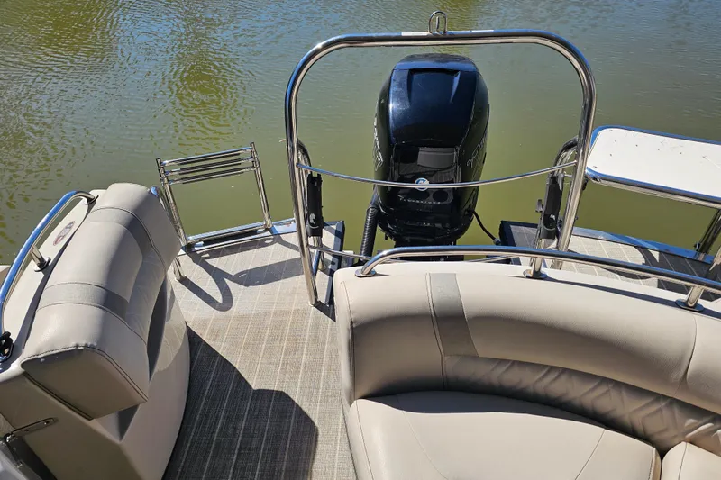 Slide: The Image of Luxurious interior of a 2018 Harris V270 boat with plush seating and modern design. - 35