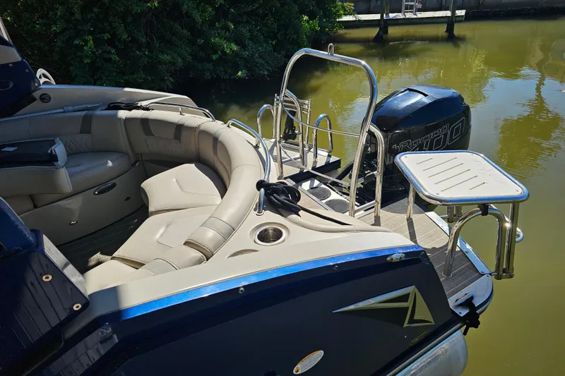 Slide: The Image of Luxurious seating on 2018 Harris V270 pontoon boat, featuring plush, curved upholstery. - 36