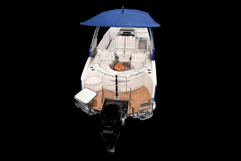 Slide: The Image of Manufacturer Provided Image: 2018 Harris V270 boat dashboard with navigation screens and steering wheel. - 4