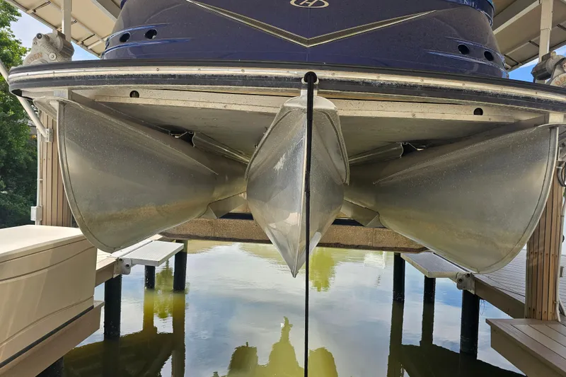 Slide: The Image of Manufacturer Provided Image: Top view of 2018 Harris V270 pontoon boat with spacious seating and modern helm. - 9