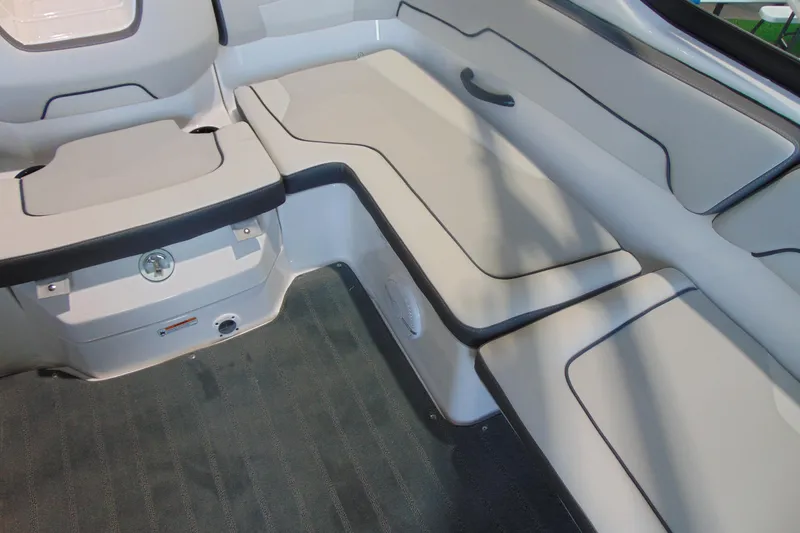 Slide: The Image of 2026 Yamaha Boats AR190 interior seating with sleek, modern design and comfortable upholstery. - 11