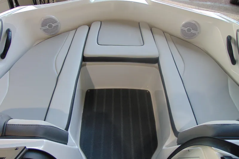 Slide: The Image of 2026 Yamaha AR190 boat interior with cushioned seating and built-in speakers. - 15