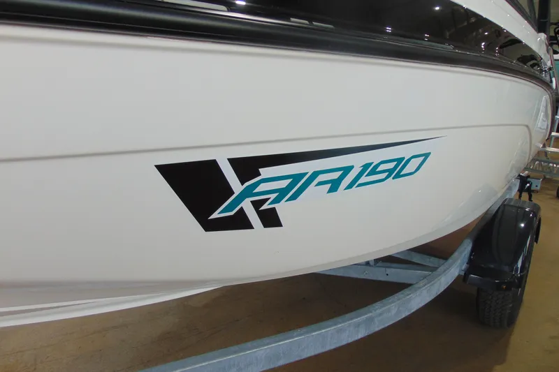 Slide: The Image of 2026 Yamaha Boats AR190, white hull with bold graphics, on a trailer. - 5