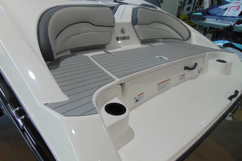 Slide: The Image of 2026 Yamaha AR190 boat with sleek seating and modern design features. - 6