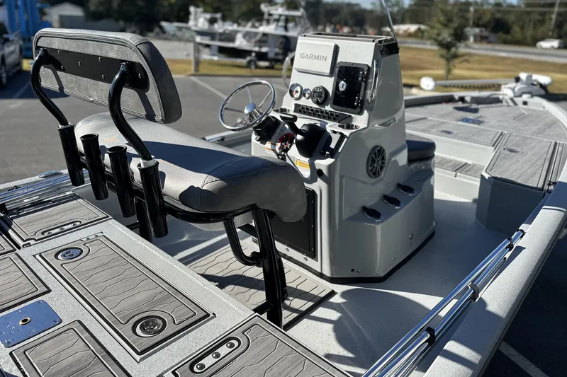 Slide: The Image of 2026 Avid 21 FSX boat interior with modern console and seating. - 13