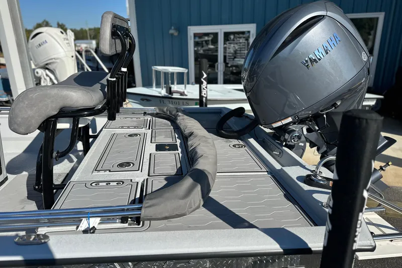Slide: The Image of 2026 Avid 21 FSX boat with Yamaha outboard motor, featuring sleek seating and deck design. - 15