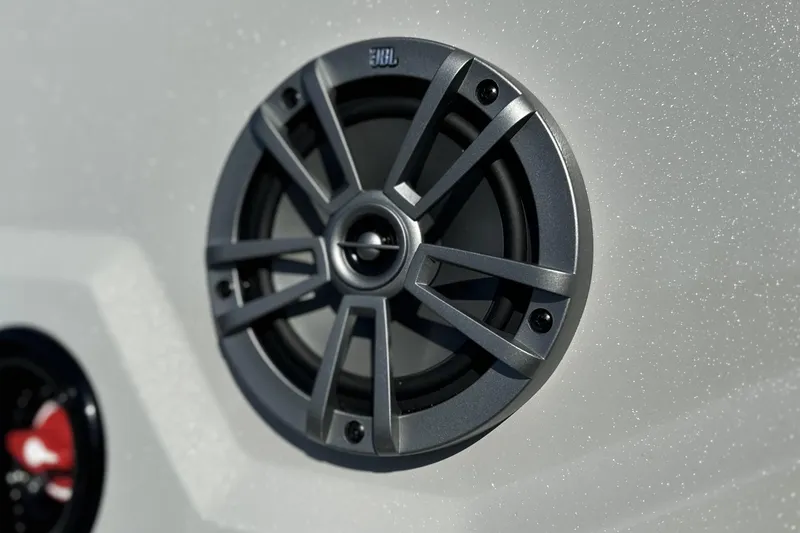 Slide: The Image of Close-up of a JBL speaker on a 2026 Avid 21 FSX boat. - 20