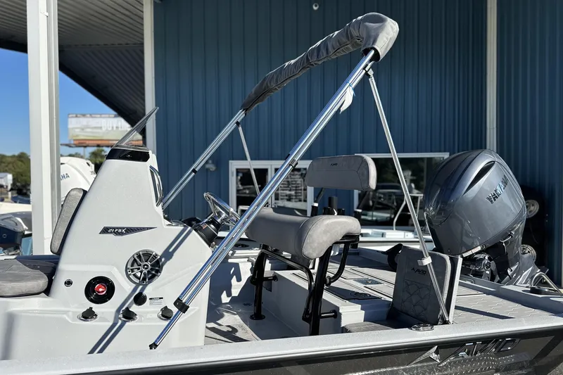 Slide: The Image of 2026 Avid 21 FSX boat with Yamaha engine, sleek design, and modern features. - 28