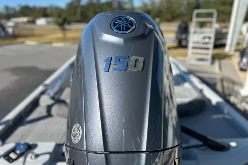 Slide: The Image of Close-up of a Yamaha 150 outboard motor on a 2026 Avid 21 FSX boat. - 9