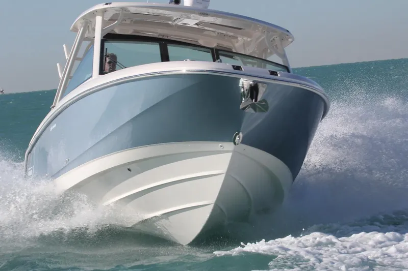 Slide: The Image of Manufacturer Provided Image: 2021 Boston Whaler 320 Vantage cruising on the water. - 4