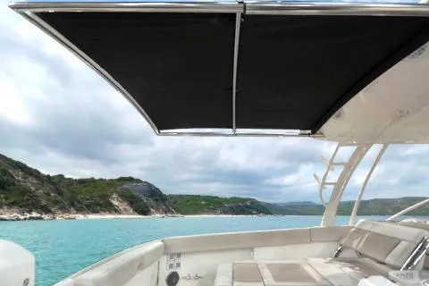 Slide: The Image of Manufacturer Provided Image: Boston Whaler 320 Vantage 2021 boat interior with ocean and coastline view. - 9