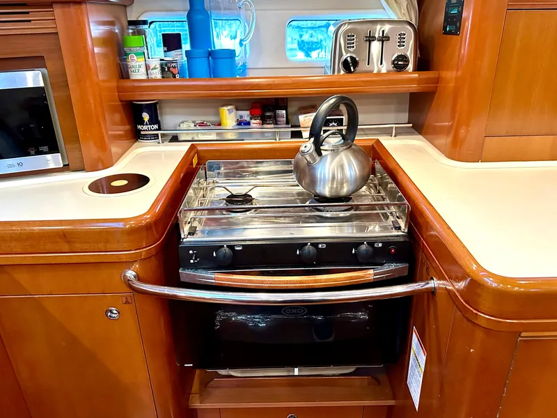 Slide: The Image of Propane stove and over and BBQ - 12