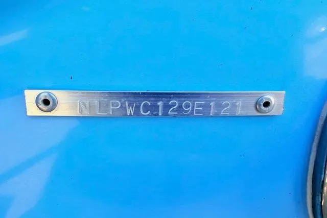 Slide: The Image of VIN plate on blue 2021 Tidewater 292 CC Adventure boat. - 22