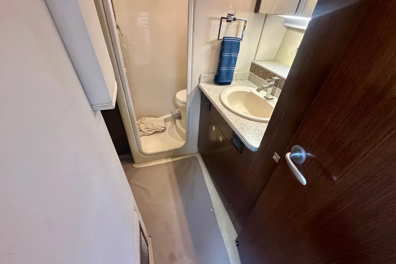 Slide: The Image of Bathroom interior of 2011 Cruisers Yachts 420 Sports Coupe with shower and sink. - 22