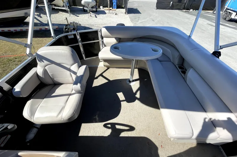 Slide: The Image of 2014 Starcraft Stardeck 190 Cruise pontoon boat with Mercury outboard motor on trailer. - 12