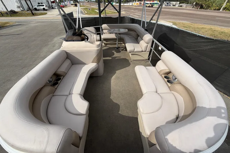 Slide: The Image of 2014 Starcraft Stardeck 190 Cruise boat interior with spacious seating and table. - 35
