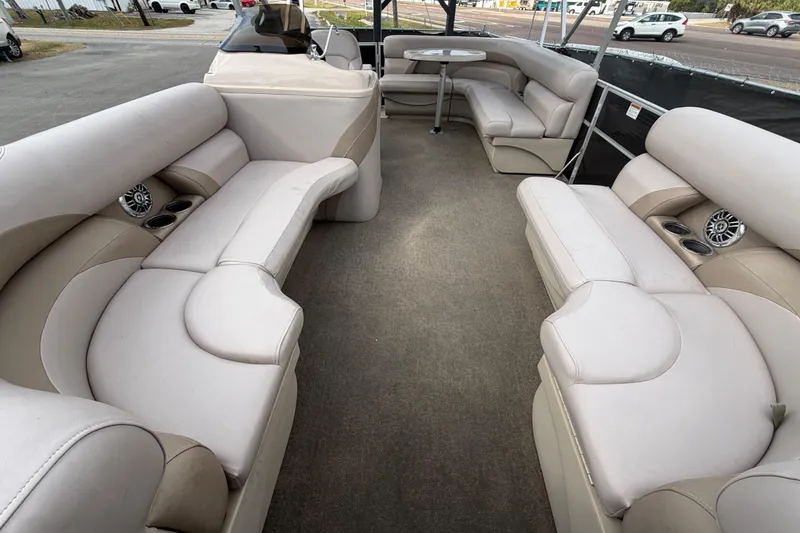 Slide: The Image of 2014 Starcraft Stardeck 190 Cruise boat interior with spacious seating and table. - 36